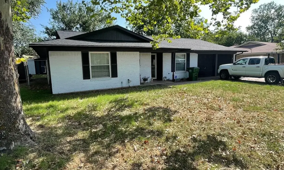 Professional roofing crew working on a residential roof in Bargersville
